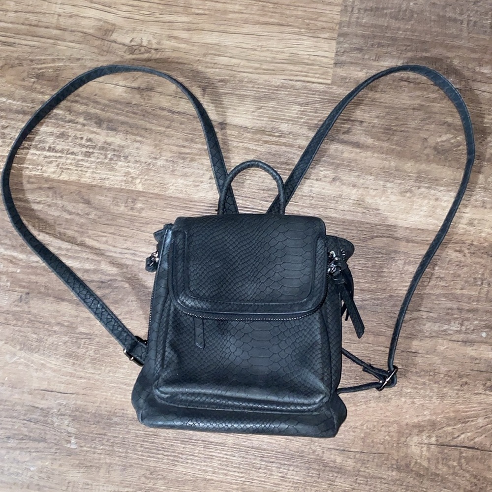 Target suede Backpack purse. Lots of zippered pockets. Great condition
